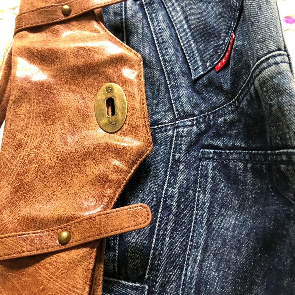 Brown Textured Handbags
